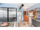 Kitchen with stainless steel cabinets and stone floor at 1251 W Rancho Dr, Phoenix, AZ 85013