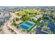 Aerial view of community amenities including tennis courts and pool at 14539 W Sheridan St, Goodyear, AZ 85395