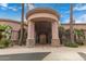 Elegant entryway with double doors and stone accents at 14539 W Sheridan St, Goodyear, AZ 85395