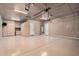 Large garage with ample storage space and epoxy flooring at 14539 W Sheridan St, Goodyear, AZ 85395