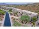 Aerial view of homes with desert landscape and mountain backdrop at 14850 E Grandview Dr # 242, Fountain Hills, AZ 85268