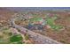 Aerial showing community near golf course and mountains at 14850 E Grandview Dr # 242, Fountain Hills, AZ 85268
