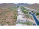 Aerial view of homes on a hillside with mountain and desert landscape at 14850 E Grandview Dr # 242, Fountain Hills, AZ 85268