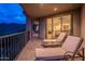 Luxurious balcony with lounge chairs, offering views and access to the interior living area at 14850 E Grandview Dr # 242, Fountain Hills, AZ 85268