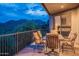 Night view from balcony featuring mountain range and outdoor seating at 14850 E Grandview Dr # 242, Fountain Hills, AZ 85268