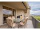 Balcony with mountain views and outdoor dining furniture at 14850 E Grandview Dr # 242, Fountain Hills, AZ 85268