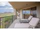 Spacious balcony offering stunning views and lounge chairs at 14850 E Grandview Dr # 242, Fountain Hills, AZ 85268