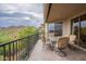 Private balcony with mountain views and outdoor seating at 14850 E Grandview Dr # 242, Fountain Hills, AZ 85268