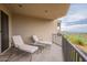 Relaxing balcony with mountain views and lounge chairs at 14850 E Grandview Dr # 242, Fountain Hills, AZ 85268