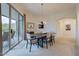 Bright dining room with access to balcony and mountain views at 14850 E Grandview Dr # 242, Fountain Hills, AZ 85268