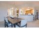 Dining room with kitchen access and a large table at 14850 E Grandview Dr # 242, Fountain Hills, AZ 85268