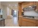 Bright kitchen with gas cooktop and access to a patio at 14850 E Grandview Dr # 242, Fountain Hills, AZ 85268