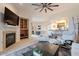 Living room boasts fireplace, built-ins and an open floorplan at 14850 E Grandview Dr # 242, Fountain Hills, AZ 85268