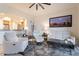 Spacious living room with comfortable seating and mountain views at 14850 E Grandview Dr # 242, Fountain Hills, AZ 85268
