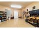 Workshop area in garage with shelving and workbench at 15115 E Sundown Dr, Fountain Hills, AZ 85268