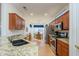 Well-equipped kitchen featuring stainless steel appliances and granite countertops at 15608 W Vista Grande Ln, Surprise, AZ 85374