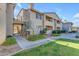 Building exterior showcasing landscaping and a walkway to the entrance at 16013 S Desert Foothills Pkwy # 1035, Phoenix, AZ 85048