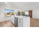 Modern kitchen featuring a large island and ample counter space at 17615 N Whispering Oaks Dr, Sun City West, AZ 85375