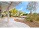 Covered patio with pergola and desert landscaping at 18749 N Siltstone Ln, Surprise, AZ 85387