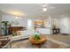 Open living room with views into kitchen and entryway at 18749 N Siltstone Ln, Surprise, AZ 85387