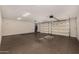 Spacious garage with epoxy flooring and overhead storage at 18884 N 98Th St, Scottsdale, AZ 85255