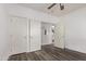 Spacious bedroom with two doors and a view of the upper level at 19668 E Carriage Way, Queen Creek, AZ 85142