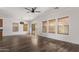 Open living area with sliding glass doors leading to a patio at 19668 E Carriage Way, Queen Creek, AZ 85142