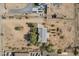 Aerial view of a house with solar panels and a large yard at 19933 E San Tan Blvd, Queen Creek, AZ 85142