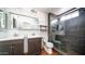 Bathroom with double vanity, walk-in shower and wood floor at 2020 W Union Hills Dr # 246, Phoenix, AZ 85027