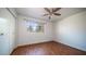 Bright bedroom with wood-look flooring and ample closet space at 2020 W Union Hills Dr # 246, Phoenix, AZ 85027