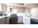 Modern kitchen with gray cabinets, stainless steel appliances at 2020 W Union Hills Dr # 246, Phoenix, AZ 85027