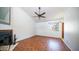 Living room with wood-look flooring, fireplace, and lots of natural light at 2020 W Union Hills Dr # 246, Phoenix, AZ 85027