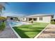 Single-story home with a large backyard and sparkling pool at 23075 E Stonecrest Dr, Queen Creek, AZ 85142