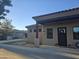 Front view of house with dark brown door and wreath at 23323 S 199Th Pl, Queen Creek, AZ 85142