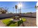 Small backyard with patio furniture and artificial turf at 331 E Pierce St, Tempe, AZ 85288