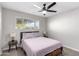 Bedroom with a queen bed, ceiling fan, and wood nightstands at 331 E Pierce St, Tempe, AZ 85288