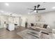 Open living room with a white kitchen island and beige sofa at 331 E Pierce St, Tempe, AZ 85288