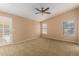 Bright bedroom with two windows and ceiling fan at 4008 E Cholla Canyon Dr, Phoenix, AZ 85044