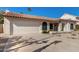 Single-story home with a two-car garage and desert landscaping at 4008 E Cholla Canyon Dr, Phoenix, AZ 85044