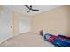 Bedroom with a toddler bed and closet at 5677 S 239Th Dr, Buckeye, AZ 85326