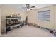 Bright bedroom with ample closet space and neutral walls at 5677 S 239Th Dr, Buckeye, AZ 85326