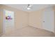 Bedroom with closet and access to a hallway at 5677 S 239Th Dr, Buckeye, AZ 85326