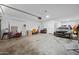 Spacious garage with ample room for storage and a vehicle at 5677 S 239Th Dr, Buckeye, AZ 85326