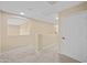Upstairs hallway with access to bedrooms and stairs at 5677 S 239Th Dr, Buckeye, AZ 85326