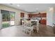 Bright kitchen with an eat-in area, lots of cabinet space, and sliding door access to backyard at 5677 S 239Th Dr, Buckeye, AZ 85326