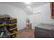 Laundry room with washer, dryer, and storage space at 5677 S 239Th Dr, Buckeye, AZ 85326