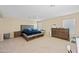 Large main bedroom with plush bed and plenty of natural light at 5677 S 239Th Dr, Buckeye, AZ 85326
