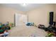 Spacious playroom with toys and access to hallway at 5677 S 239Th Dr, Buckeye, AZ 85326