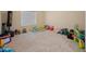 Playroom with toys and play area at 5677 S 239Th Dr, Buckeye, AZ 85326