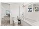 Bathroom with a bathtub, shower, toilet, and modern finishes at 5741 N 38Th Pl, Paradise Valley, AZ 85253